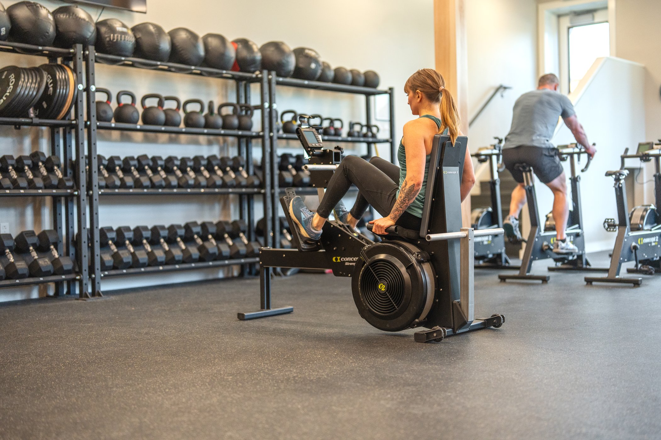 Woman on StrengthErg in gym setting