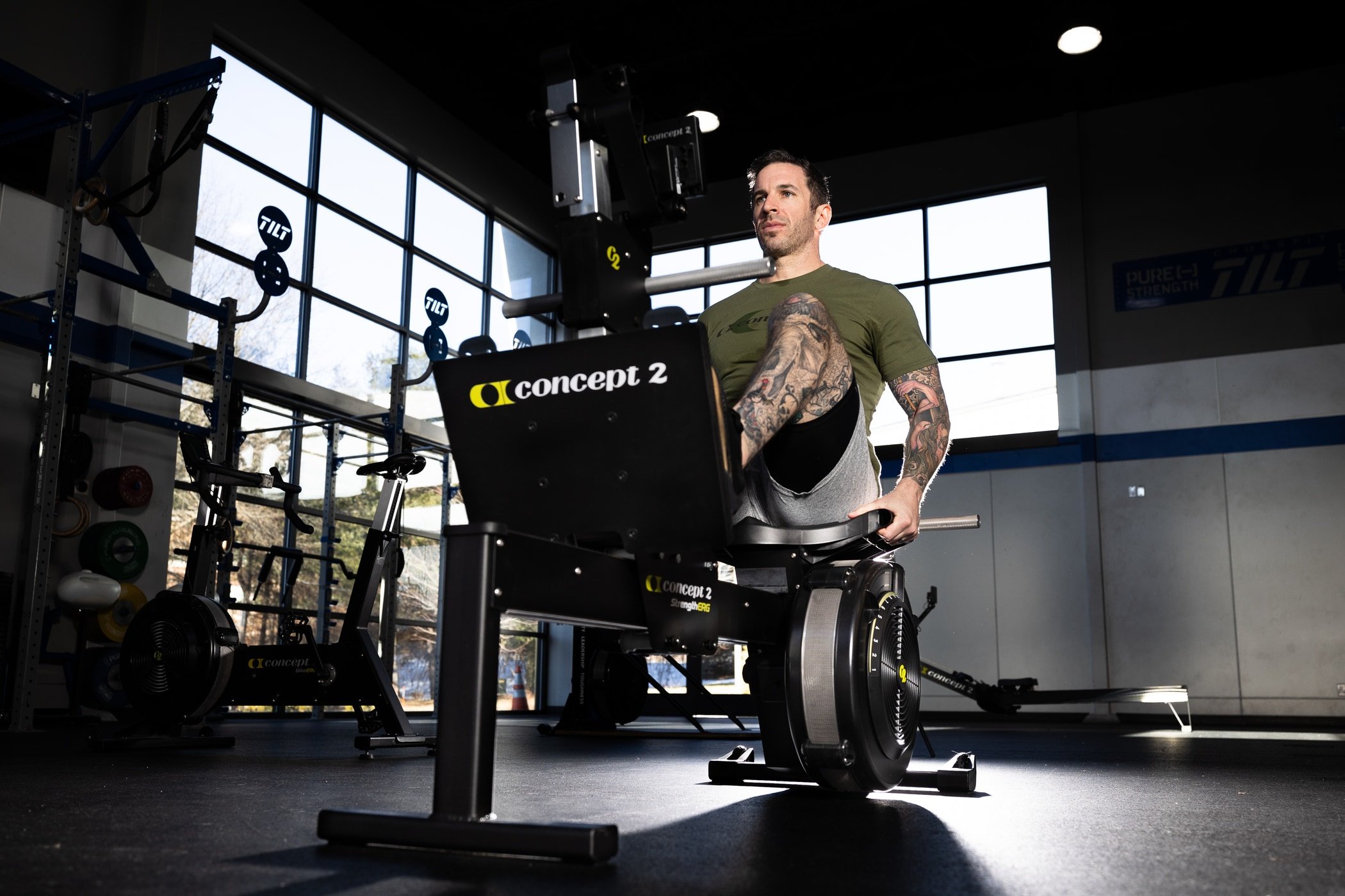 Man in gym doing leg press on a StrengthErg