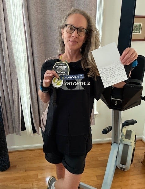 Woman with Note and Concept2 RowErg