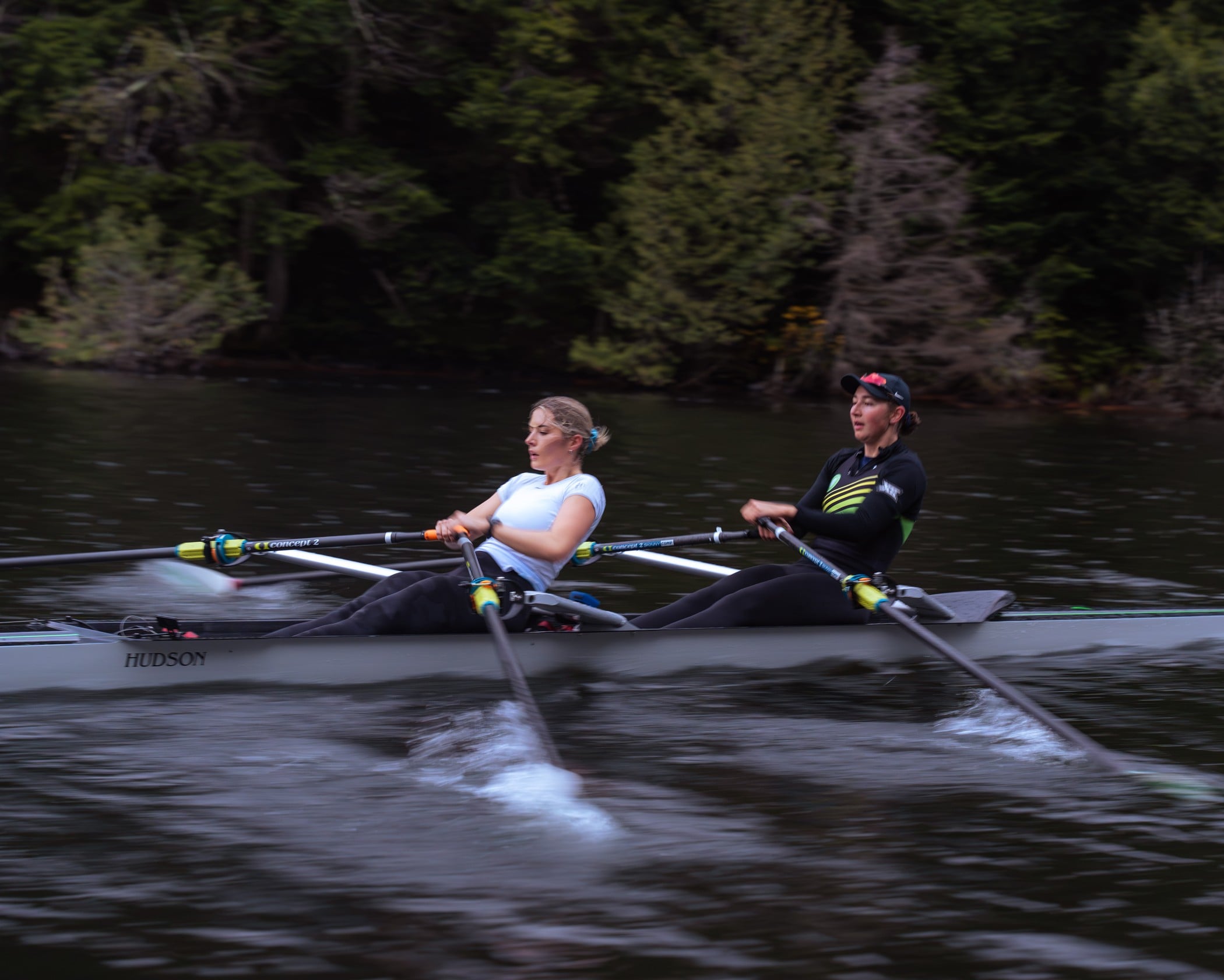 two women rowing in a double with concept2 comp blades