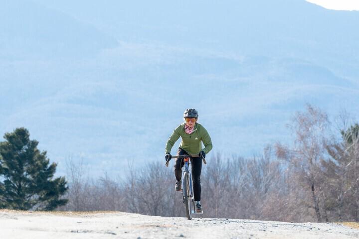 gravel bike rider going up incline