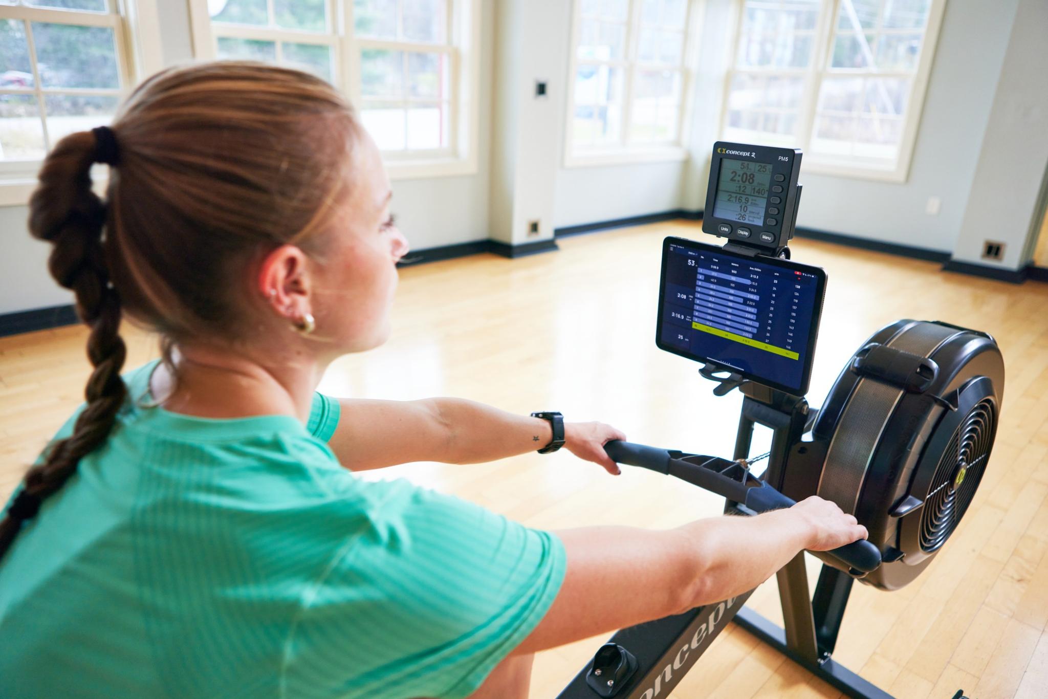 Woman on RowErg Using ErgData