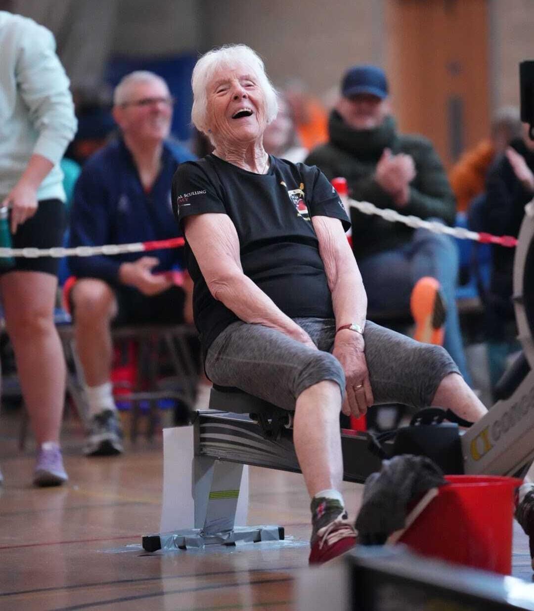 Women Celebrating after indoor erg race