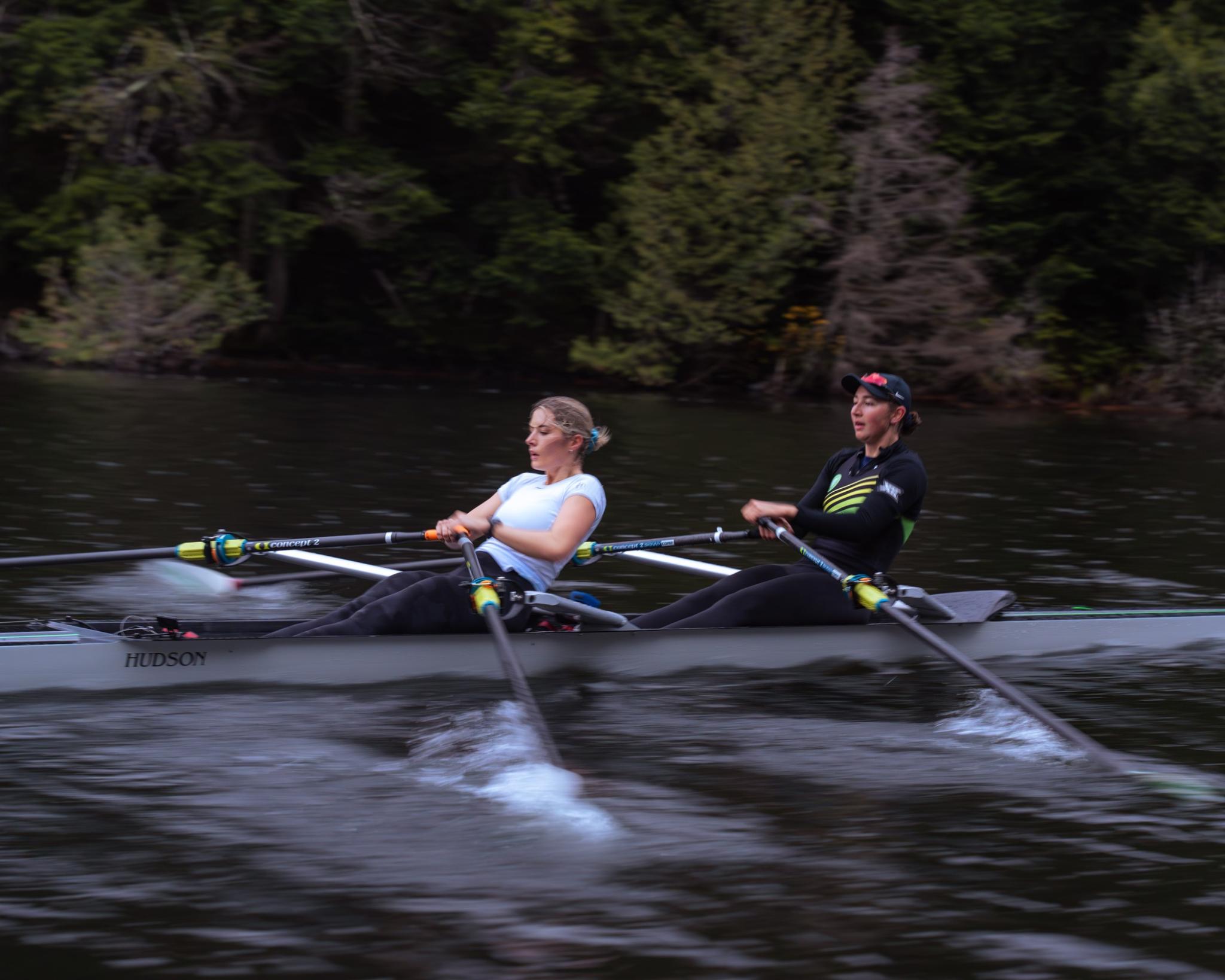 two women rowing in a double with concept2 comp blades