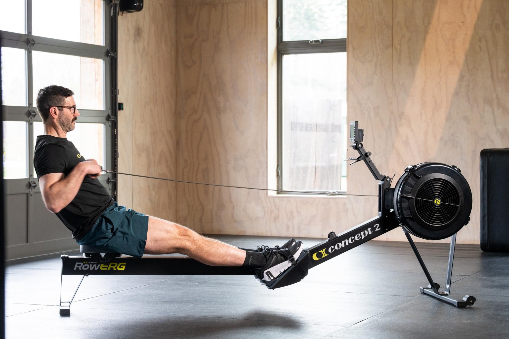 man on rowerg in gym
